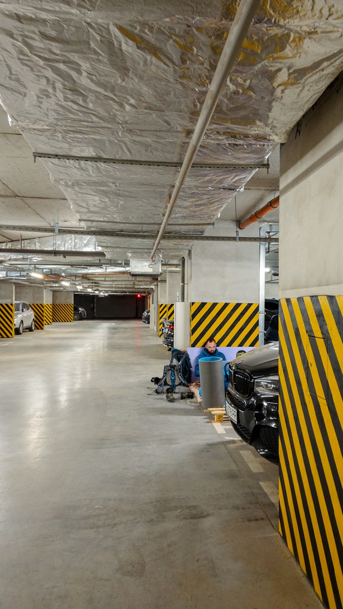 a person with a cart in a warehouse